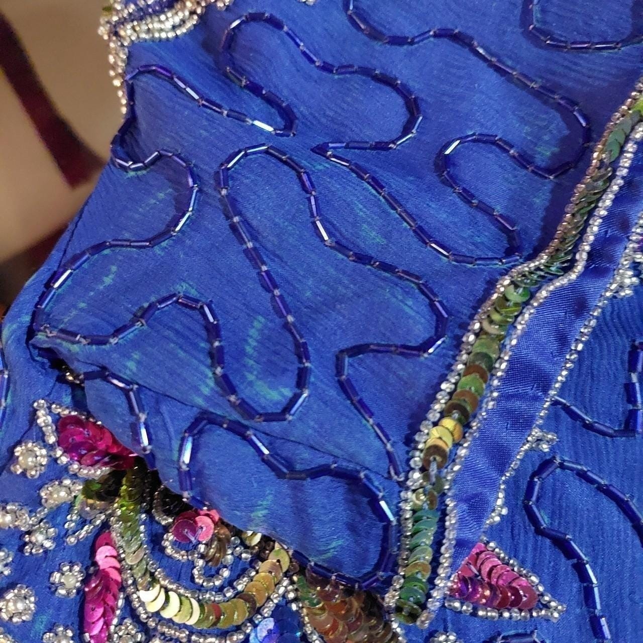 Vintage 100% pure silk blue fully beaded dress.