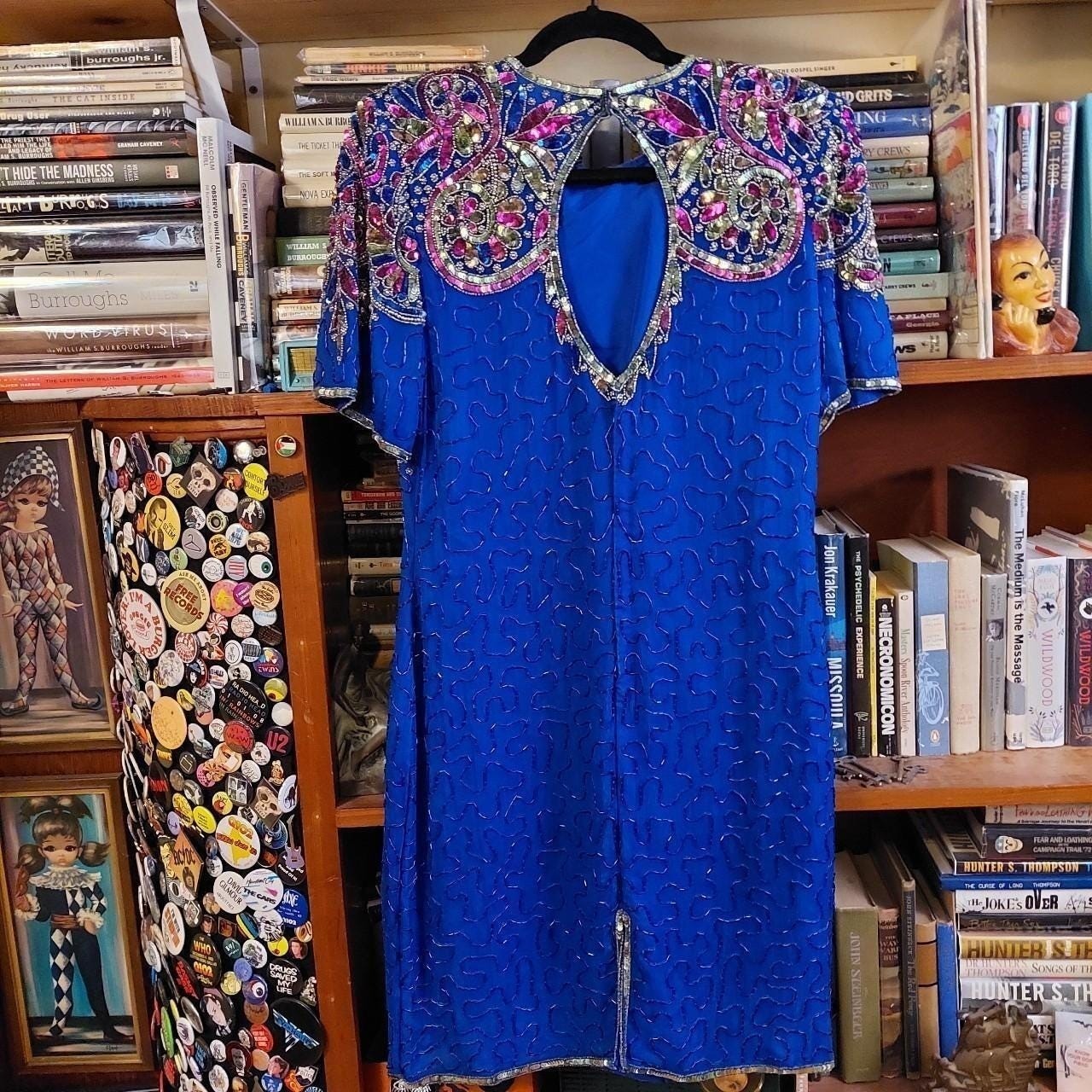 Vintage 100% pure silk blue fully beaded dress.