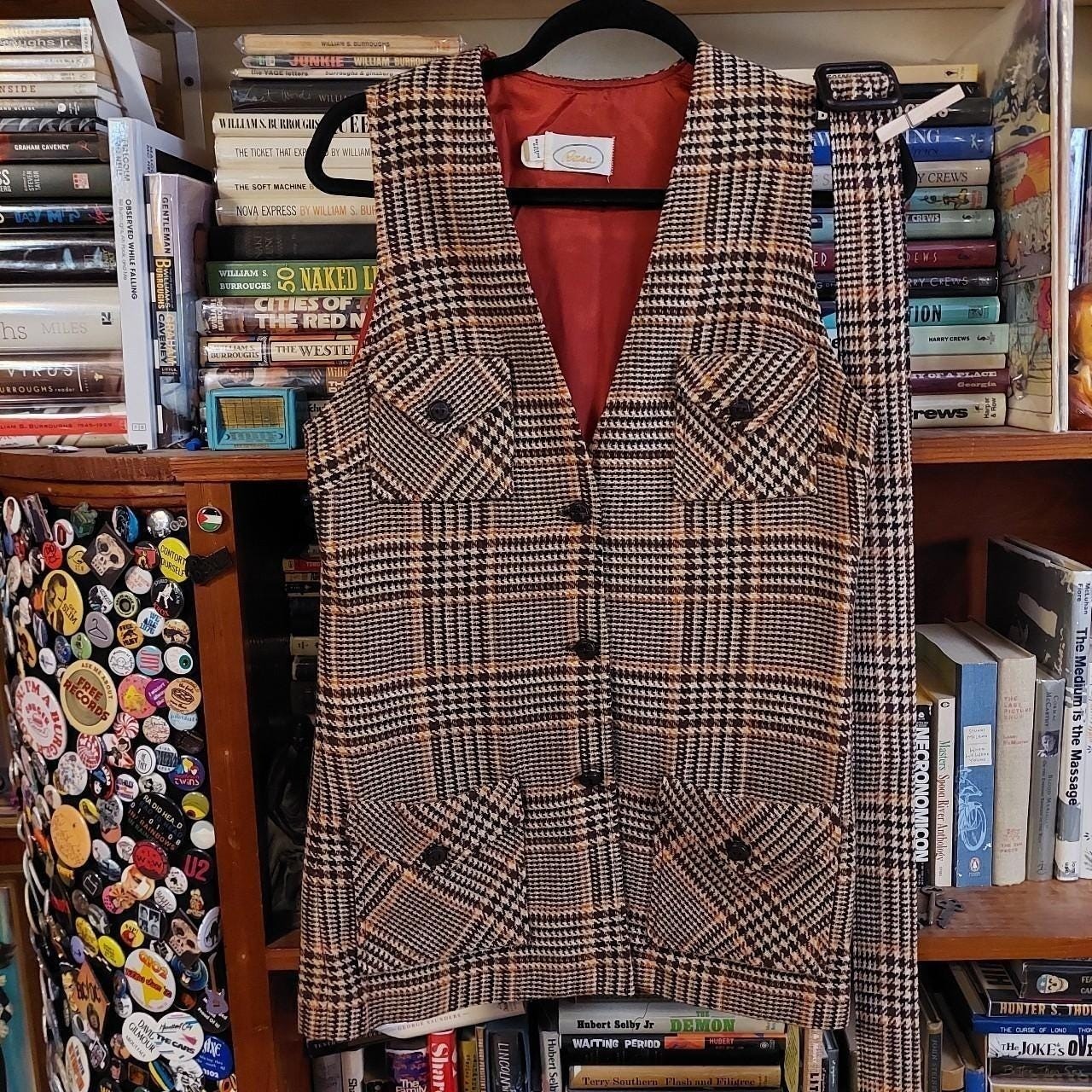 Vintage brown, black, and tan long vest with matching belt.
