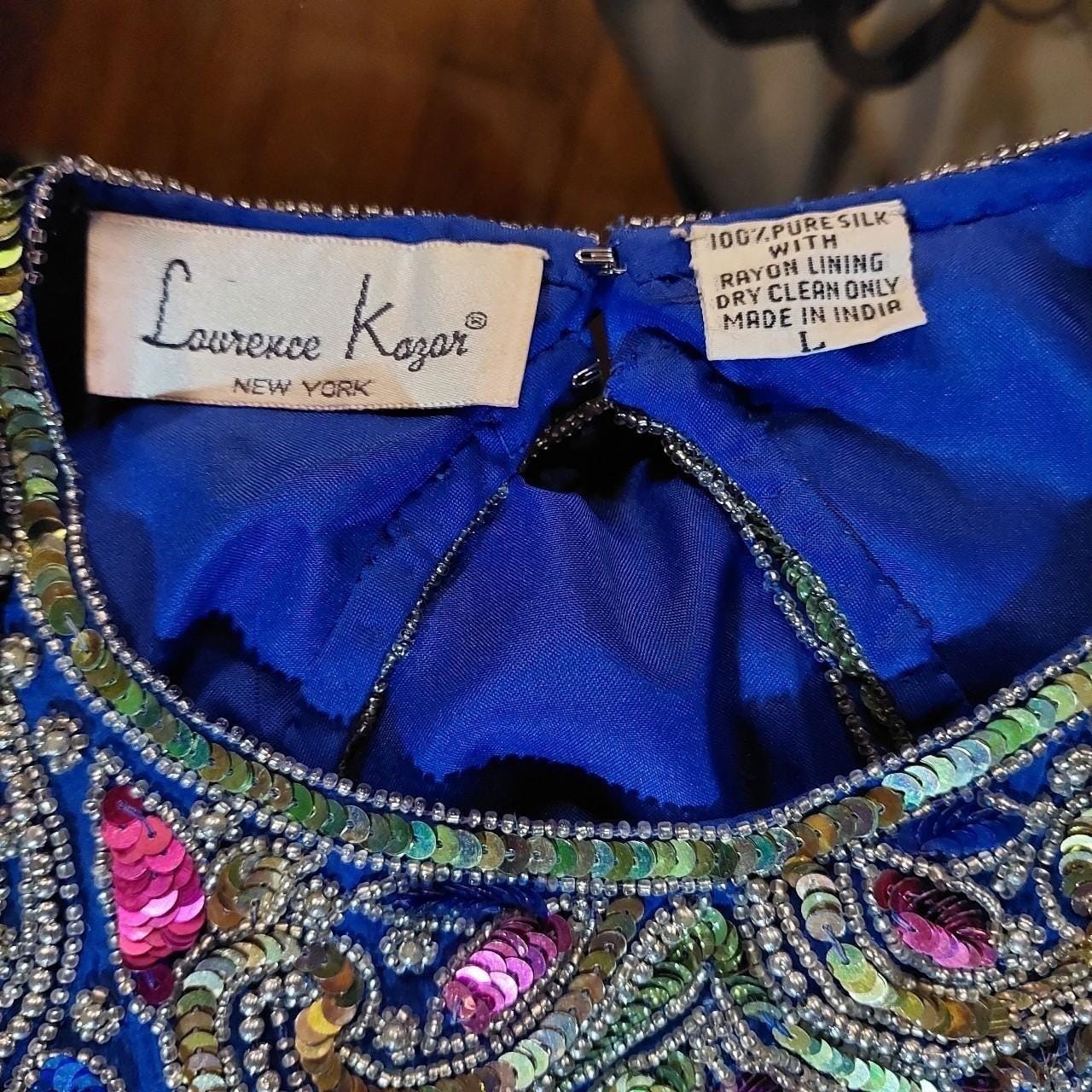 Vintage 100% pure silk blue fully beaded dress.