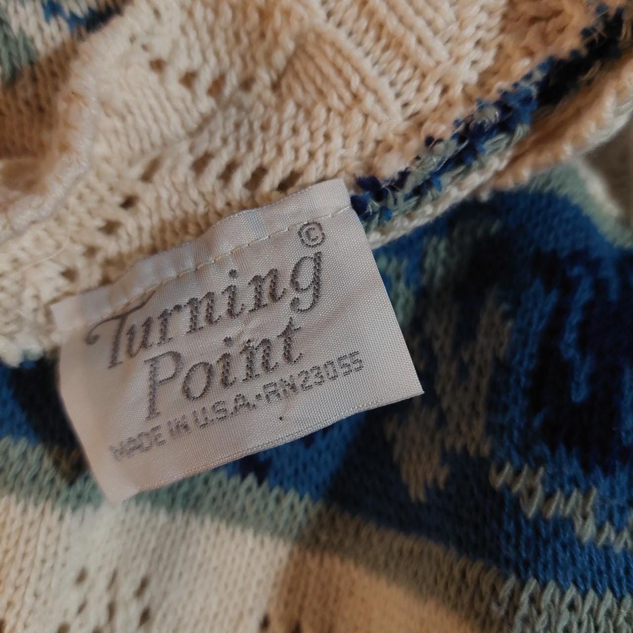 Vintage blue, green, and white striped sweater.